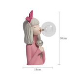 Dekoracyjna lampka LED „dziewczynka z balonem” – designerska figura do salonu i biura