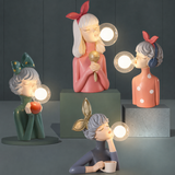 Dekoracyjna lampka LED „dziewczynka z balonem” – designerska figura do salonu i biura