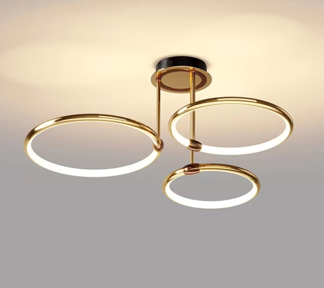 Nowoczesny żyrandol LED z pierścieniami – lampa sufitowa z geometryczną formą